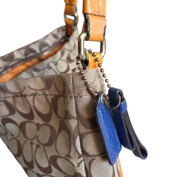 Coach Park Signature Hobo Shoulder Bag model number F23279. 